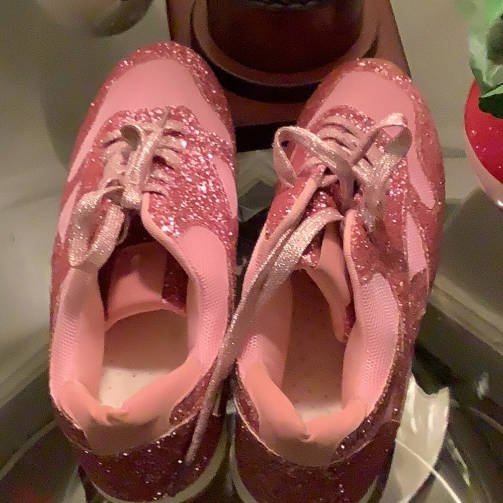 Shiny pink sneakers